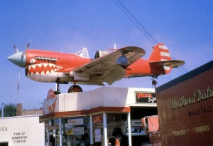 Airplane atop gas station. Airplane atop gas station.